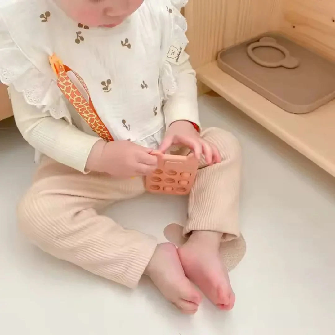 SiliPop™ - Siliconen numeriek kussentje en bijtspeeltje voor baby's