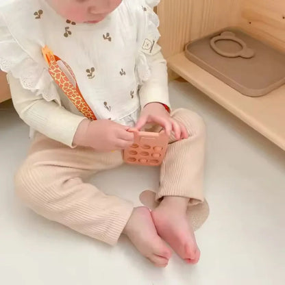 SiliPop™ - Siliconen numeriek kussentje en bijtspeeltje voor baby's