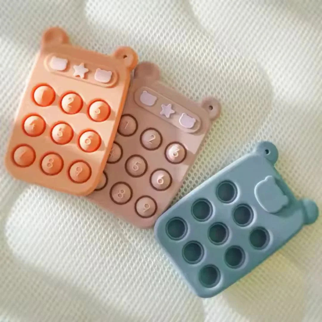 SiliPop™ - Siliconen numeriek kussentje en bijtspeeltje voor baby's